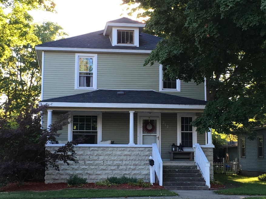 212 N Hudson St, Lowell, MI 49331 - photo 1
