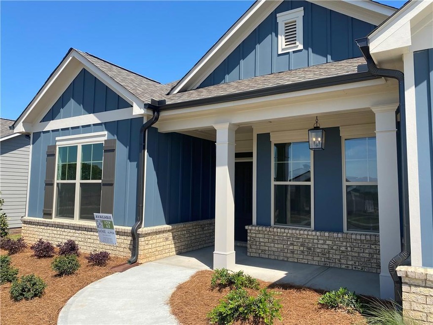 View of exterior entry featuring a porch