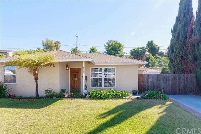 Front of home, located on a charming tree-lined an