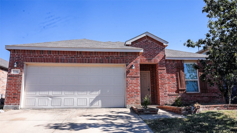 Ranch-style house featuring brick siding, roof with shingles, concrete driveway, and an attached garage