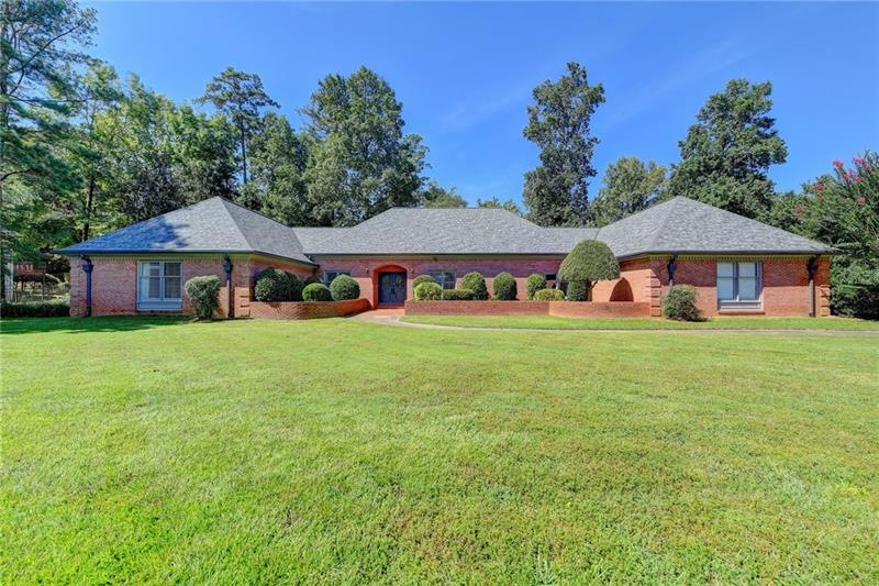 Four-sided brick RANCH on perfectly evel lot!