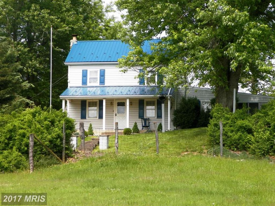 299 Warrior Dr, Bunker Hill, WV 25413 - photo 1