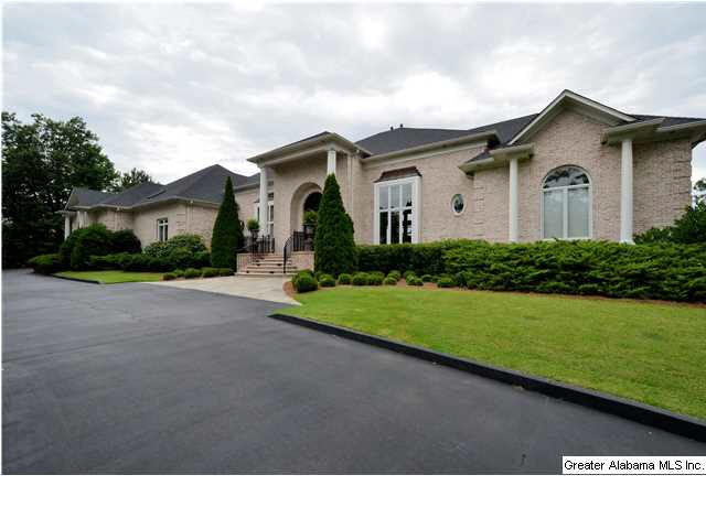 Home sits above the city on 1.7 +/- acres in Greys