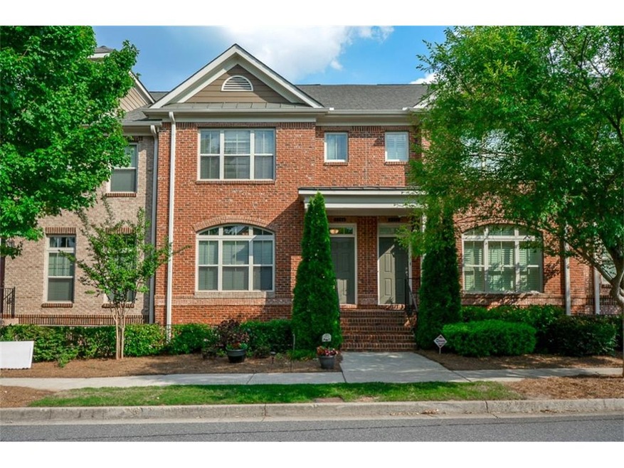 Stunning townhome in gated Three Bridges community