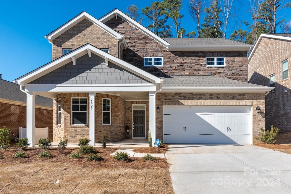 Enjoy your brand new house with a great covered front porch for your rocking chairs.