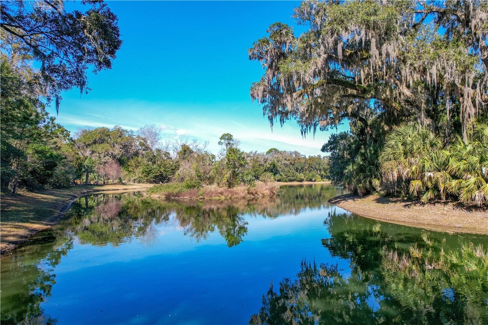 Enjoy tranquil lake views from the back porch of y