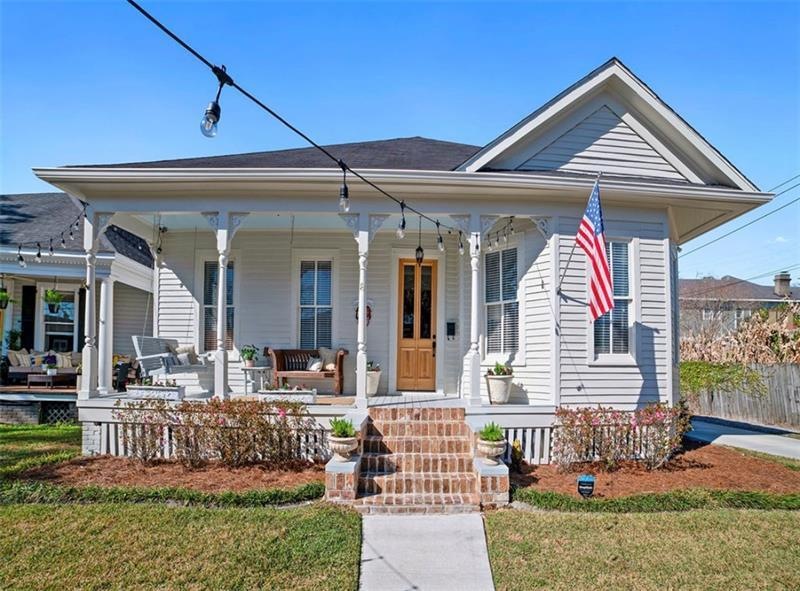 Beautiful front of home with new large 8+ foot doo