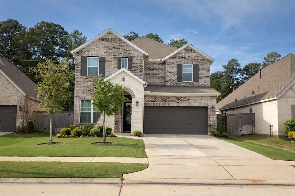 9407 Windward Bluff Way, the Woodlands, TX 77375 - photo 1