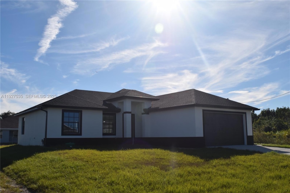 25th 25th St W, Lehigh Acres, FL 33971 - photo 1