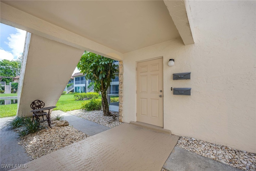 1155 Sandpiper St unit F7, Naples, FL 34102 - photo 1