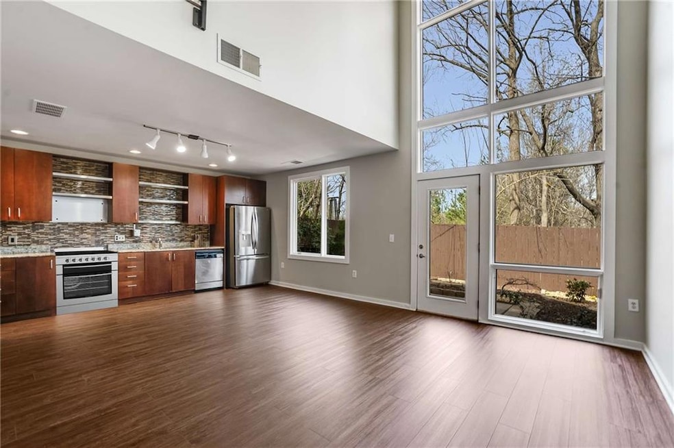 Soaring Ceilings in Family Room with floor to ceil