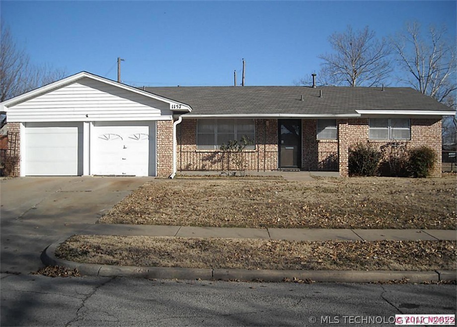 Lovely full brick home with covered porch to welco