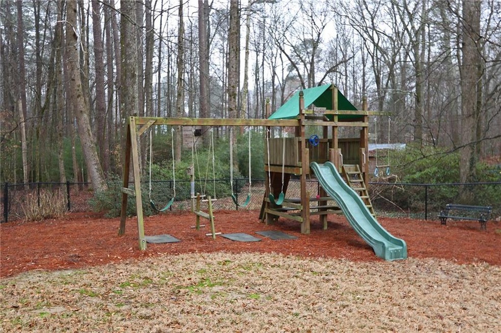 1021 Cedar Bluff Trail SW, Lilburn, GA 30047 - photo 1