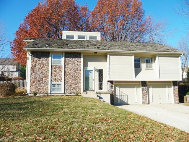 Split entry with 2 car garage and a huge fenced ba