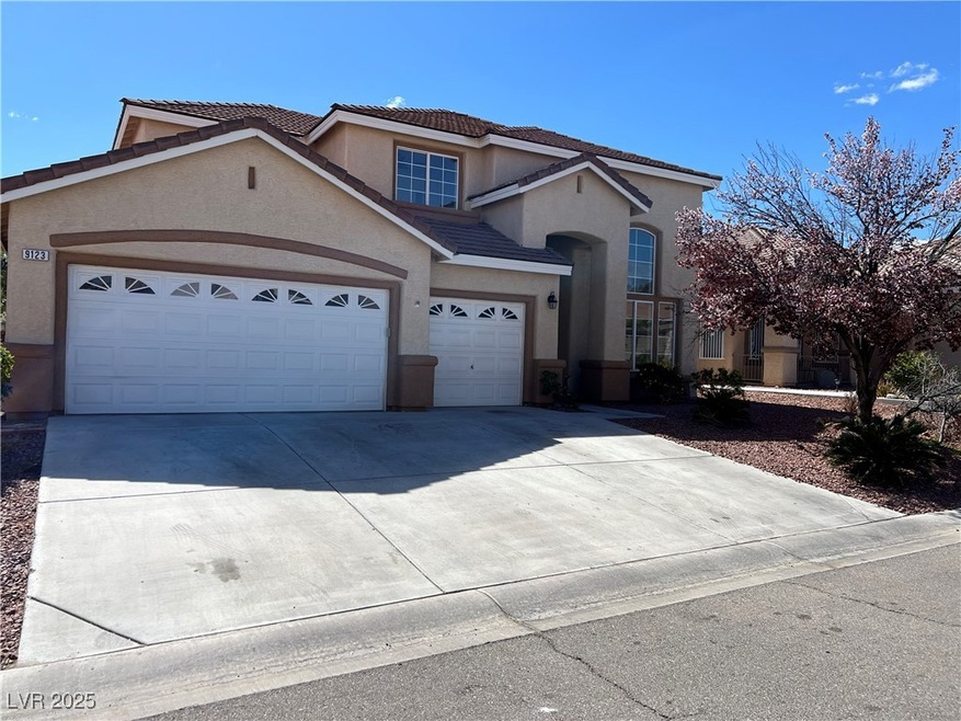 View of front of home featuring stucco siding, con