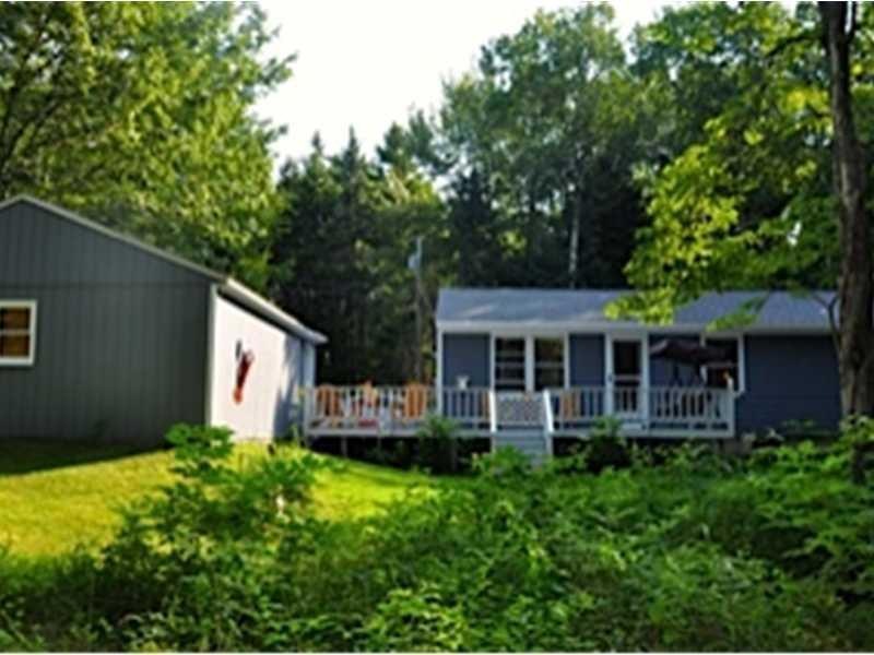 Exterior Front. Wrap around deck...