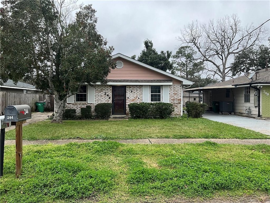 Front of house with driveway