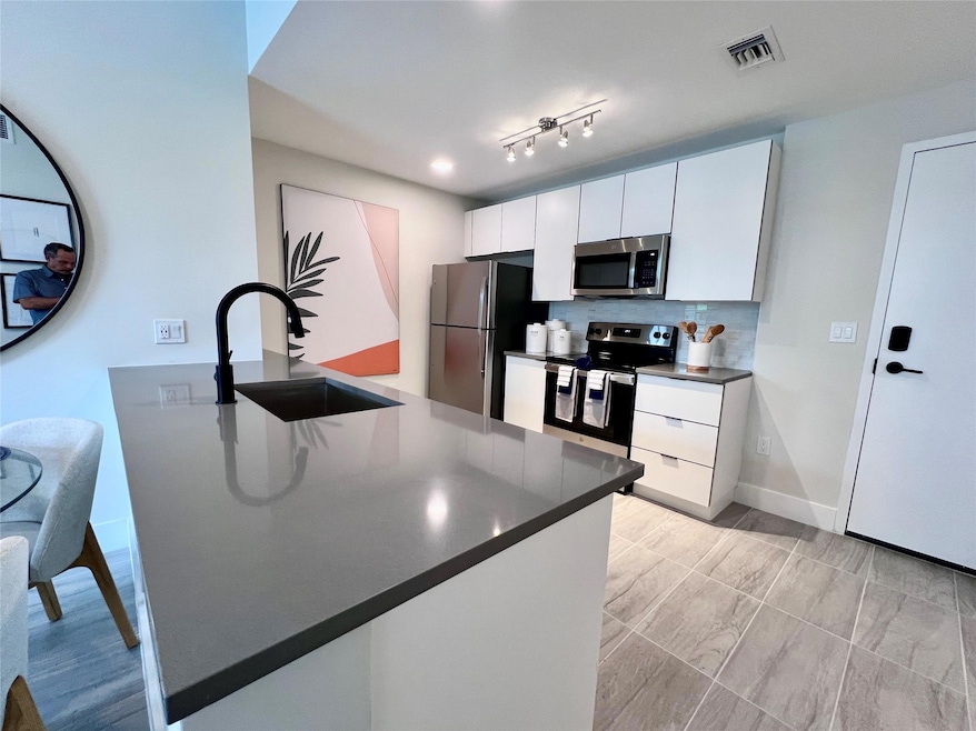 120 N Compass Way unit 435, Dania Beach, FL 33004 - photo 1