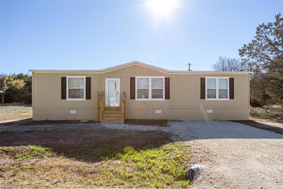 929 Nacogdoches River Dr, Granbury, TX 76048 - photo 1