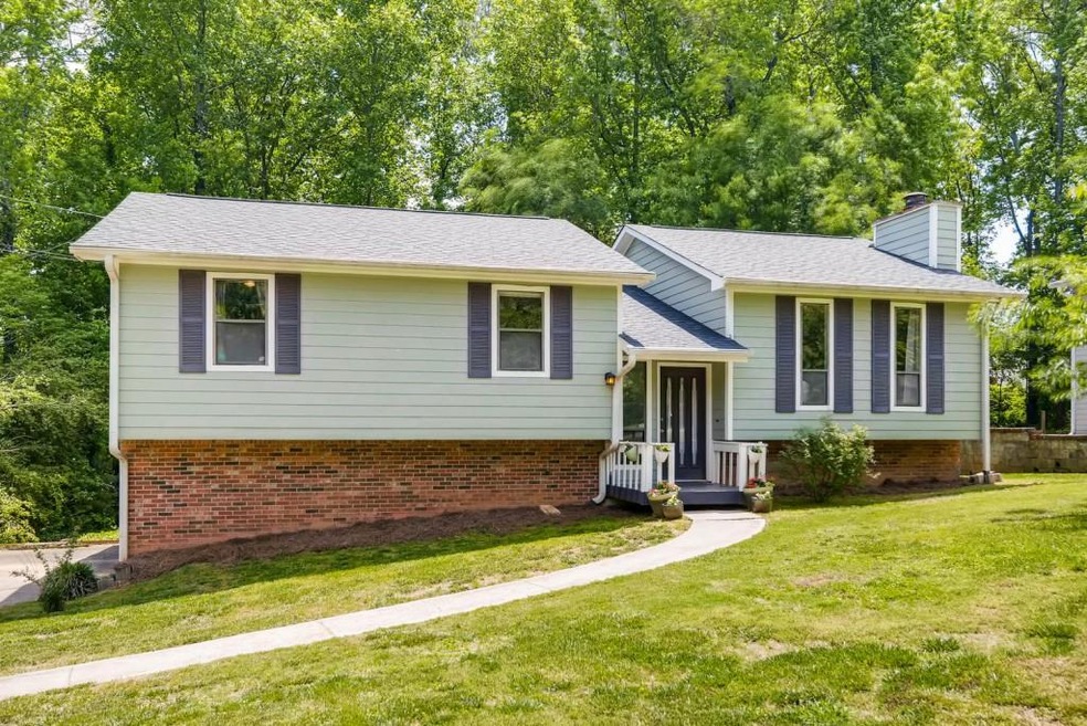 Updated home in WALTON HS! Newer hardiplank siding