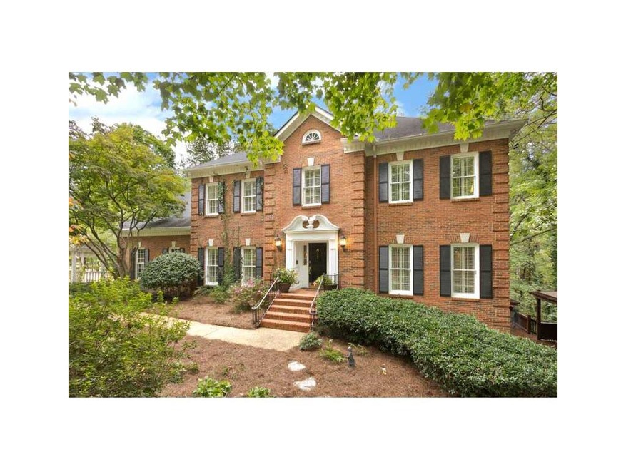 Exterior Front. Gorgeous 4 side brick in a lush na