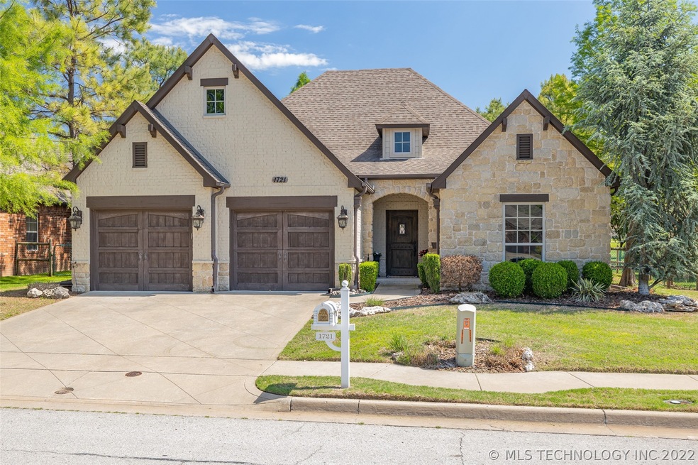 Beautiful brick & stone one level home in small ga