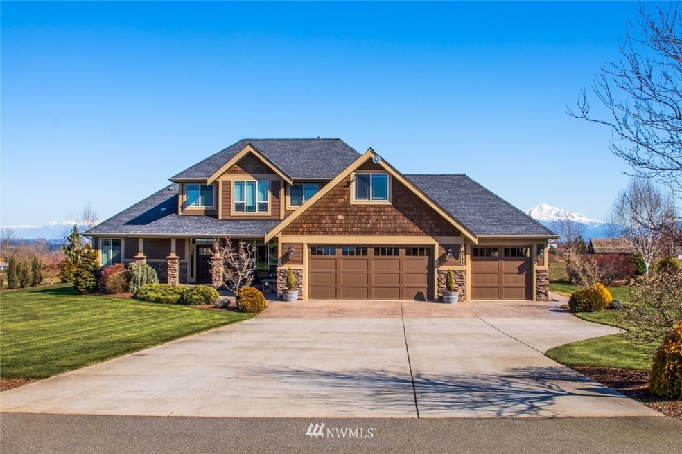 Welcome to 6752 Fairfield Place.  This gorgeous custom home sits on 1 acre parcel on paved private drive.    Stunning views of Mt. Baker and surrounding farmland.