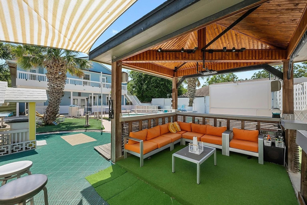View of patio / terrace with a community pool, an