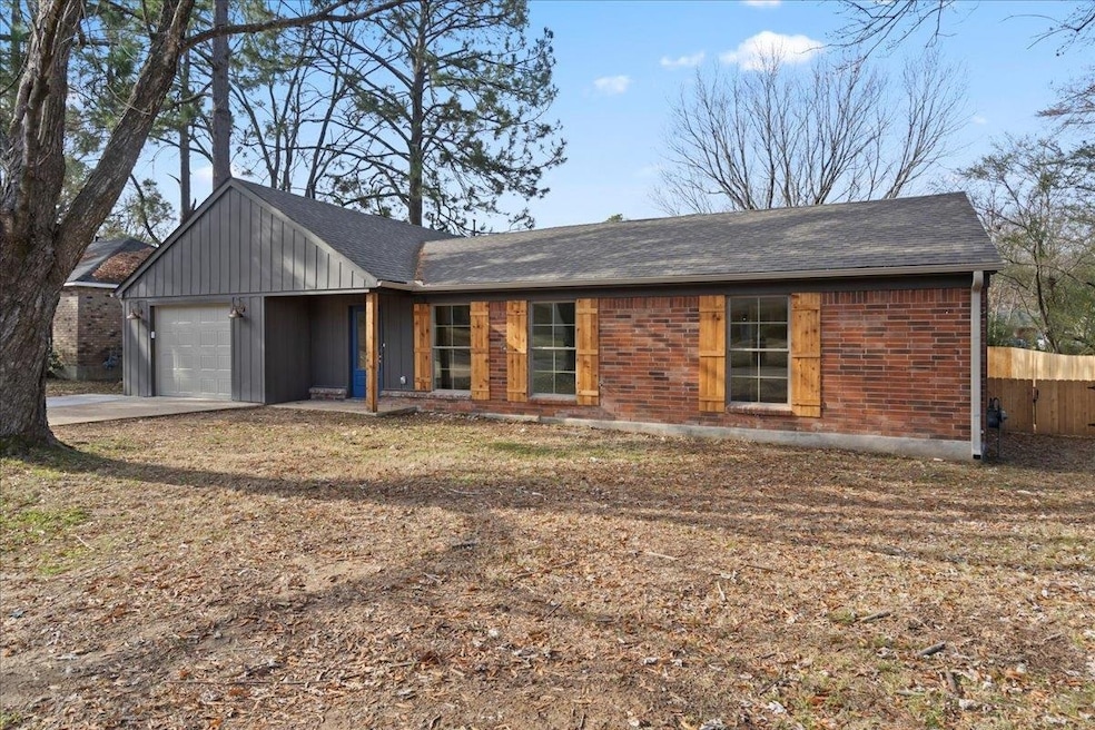 Ranch-style home with a garage