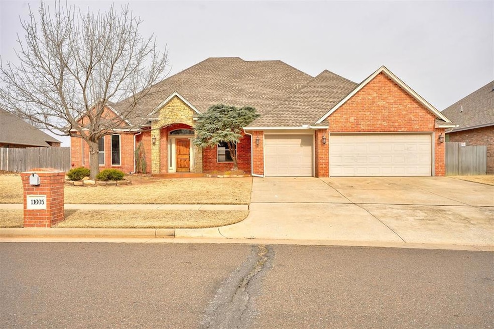 View of front of house with a 3 car garage