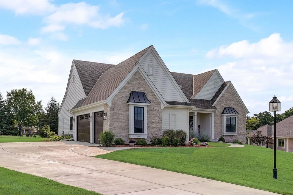 1629 Twisted Oak Ct unit 1629, Hartland, WI 53029 - photo 1