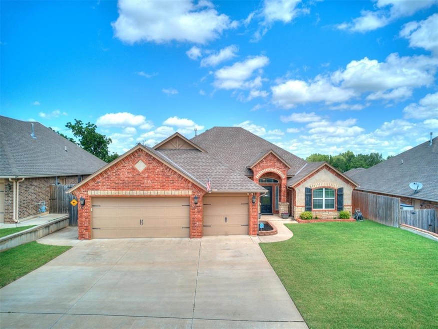 View of front facade with 3 car garage