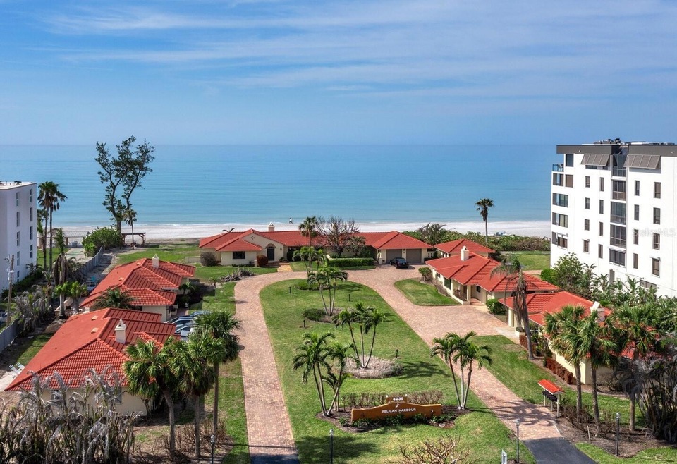One of only five manor homes in Pelican Harbour which enjoy this convenient proximity to the beautiful beach.