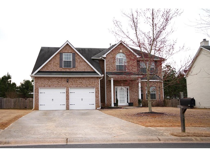 Two story traditional, brick front, cement siding,