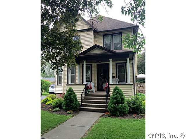 Exterior Front Vinyl siding with open front porch 