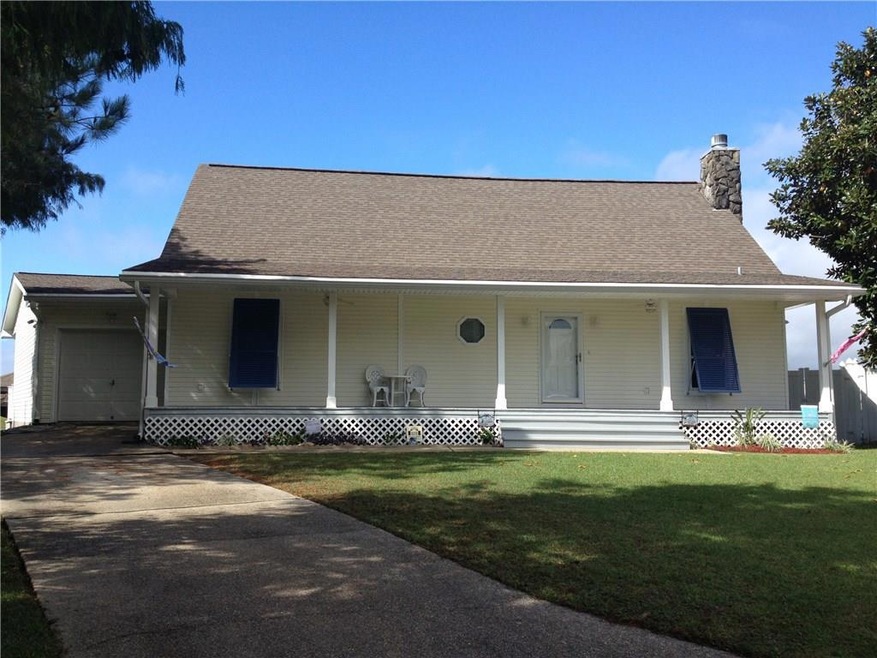 This lovely Acadian style, move-in-ready home welc