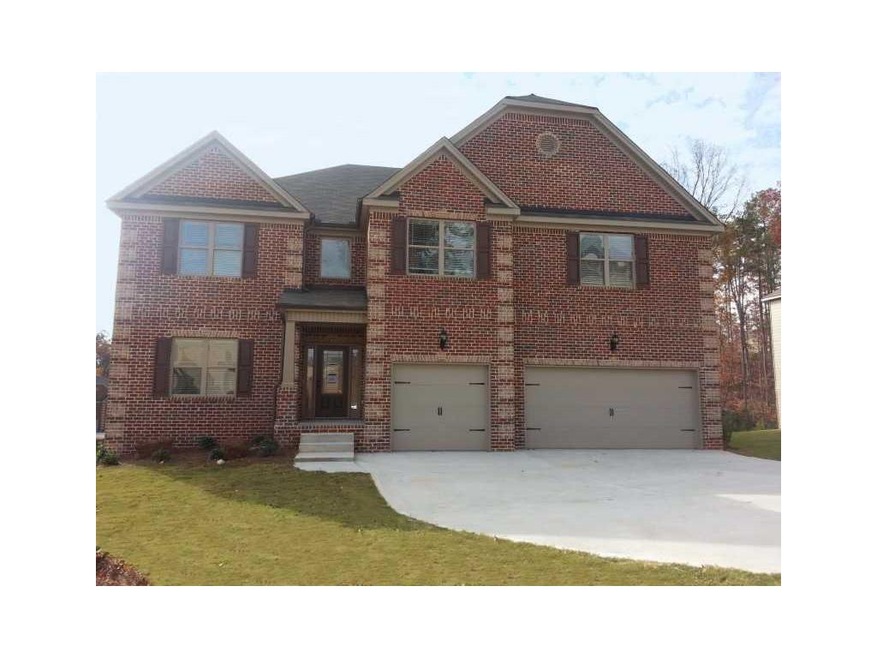 Exterior Front. *STOCK PHOTO* . 2 and 3 car garage