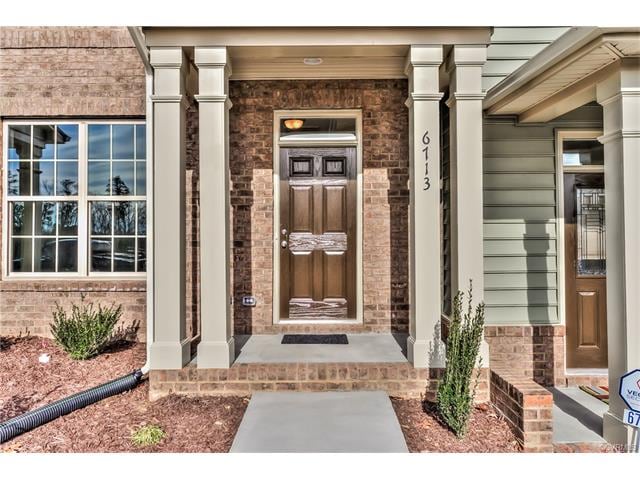 Gorgeous porch with double columns.