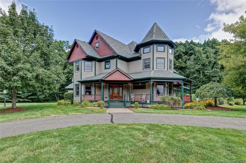 Queen Anne Victorian with wrap around porch