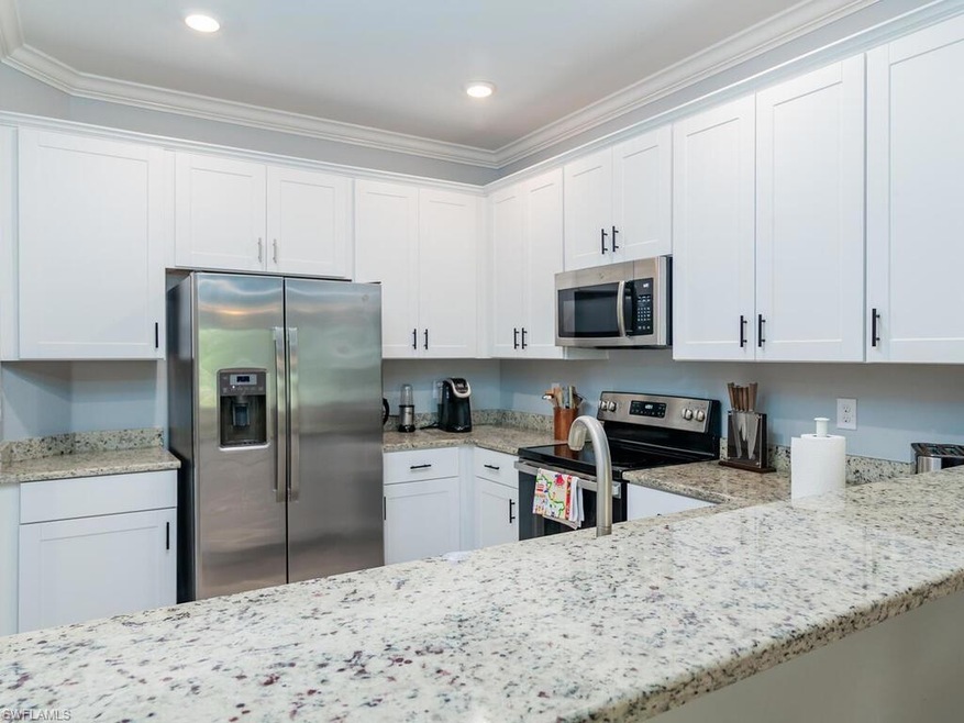 Kitchen featuring appliances with stainless steel 