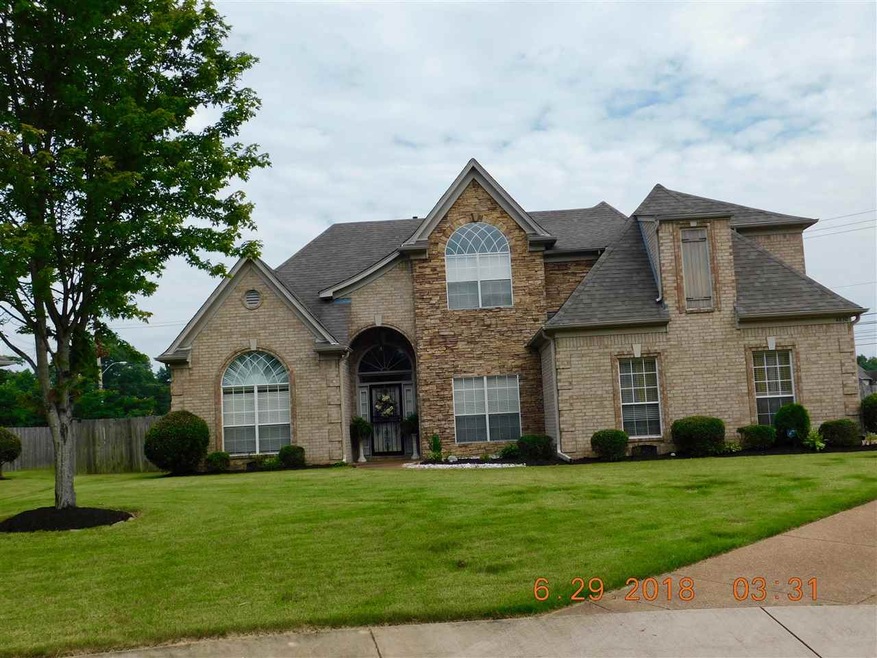 GORGEOUS STONE ENTRY! HOME ON .41 ACRES WALKING DI