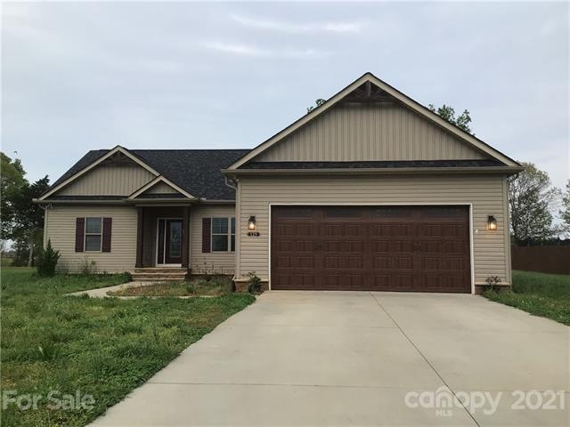 Please excuse the lawn, being cut today.