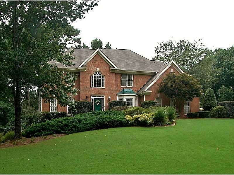 Exterior Front. BEAUTIFUL 3 SIDE BRICK HOME ON 1 A