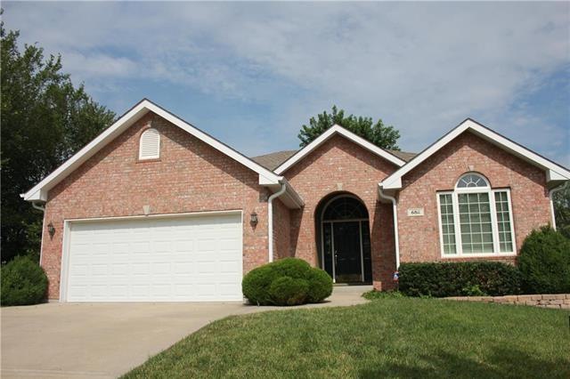 Brick front exterior give this home a distinguished air.