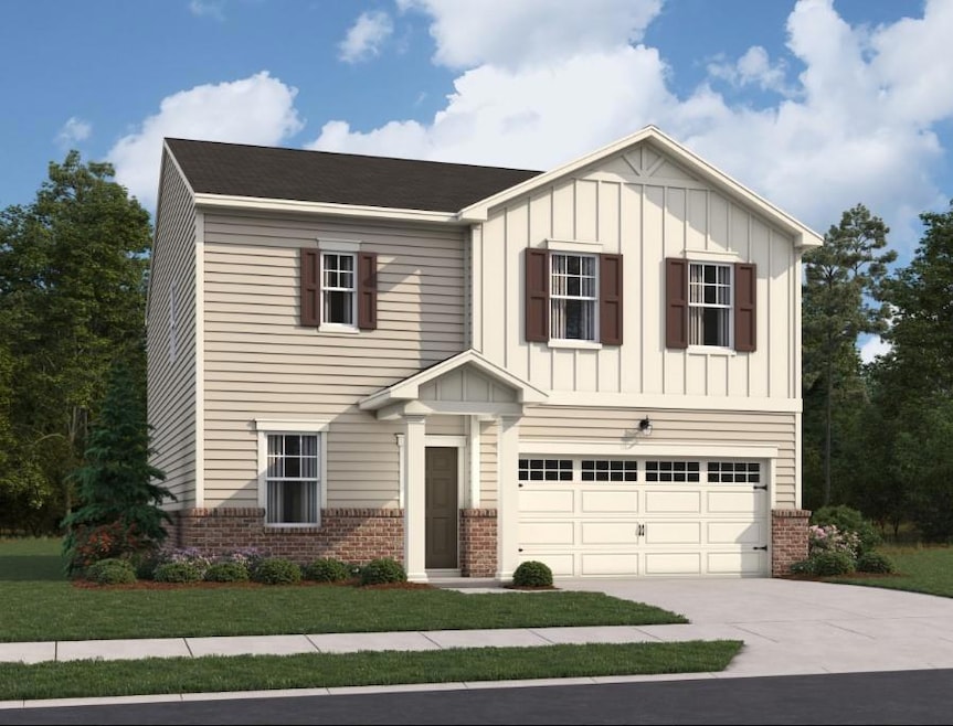 View of front of home with brick siding, concrete 