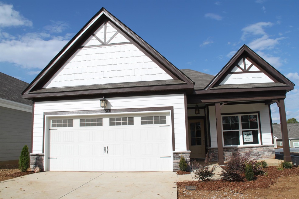 Exterior of a similar house nearing construction.