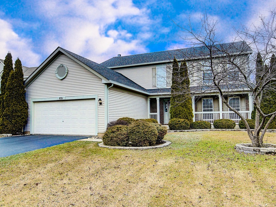 Brick and siding elevation with a covered front po