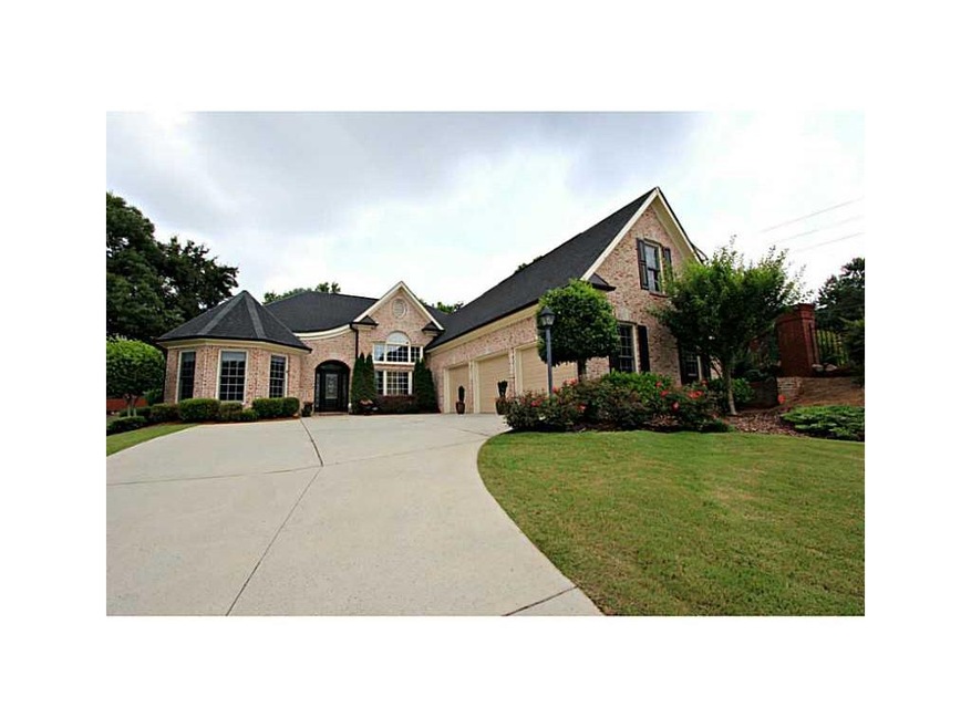 Exterior Front. Gorgeous brick home on half-acre w