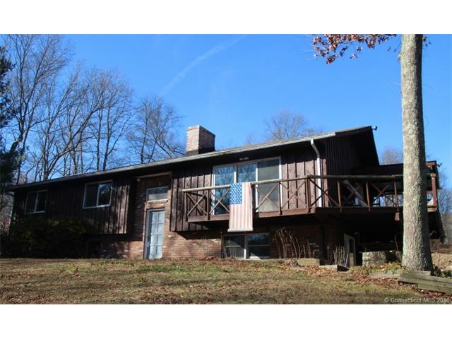 This large Raised Ranch sits on 2.22 acres private