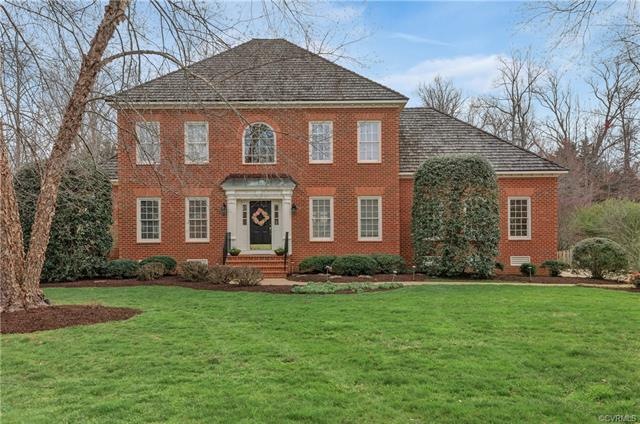 Beautiful 3 sided brick home on large 2/3 acre lot